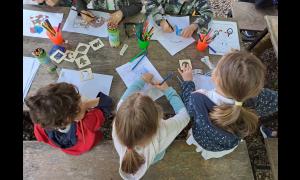 Evento biblioteca con bambini e disegni rho